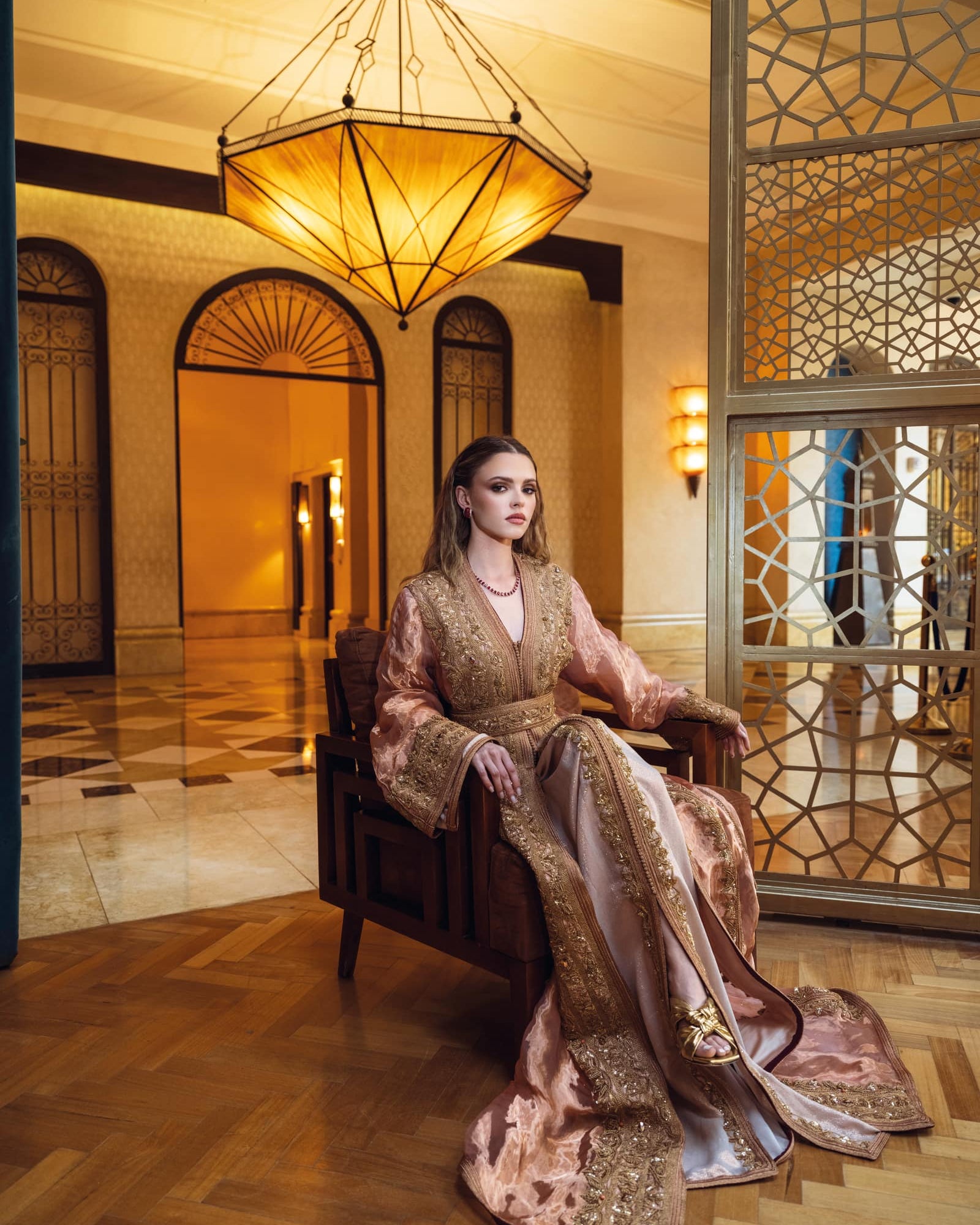 Rose gold Moroccan kaftan with soft embroidery and seated bridal silhouette