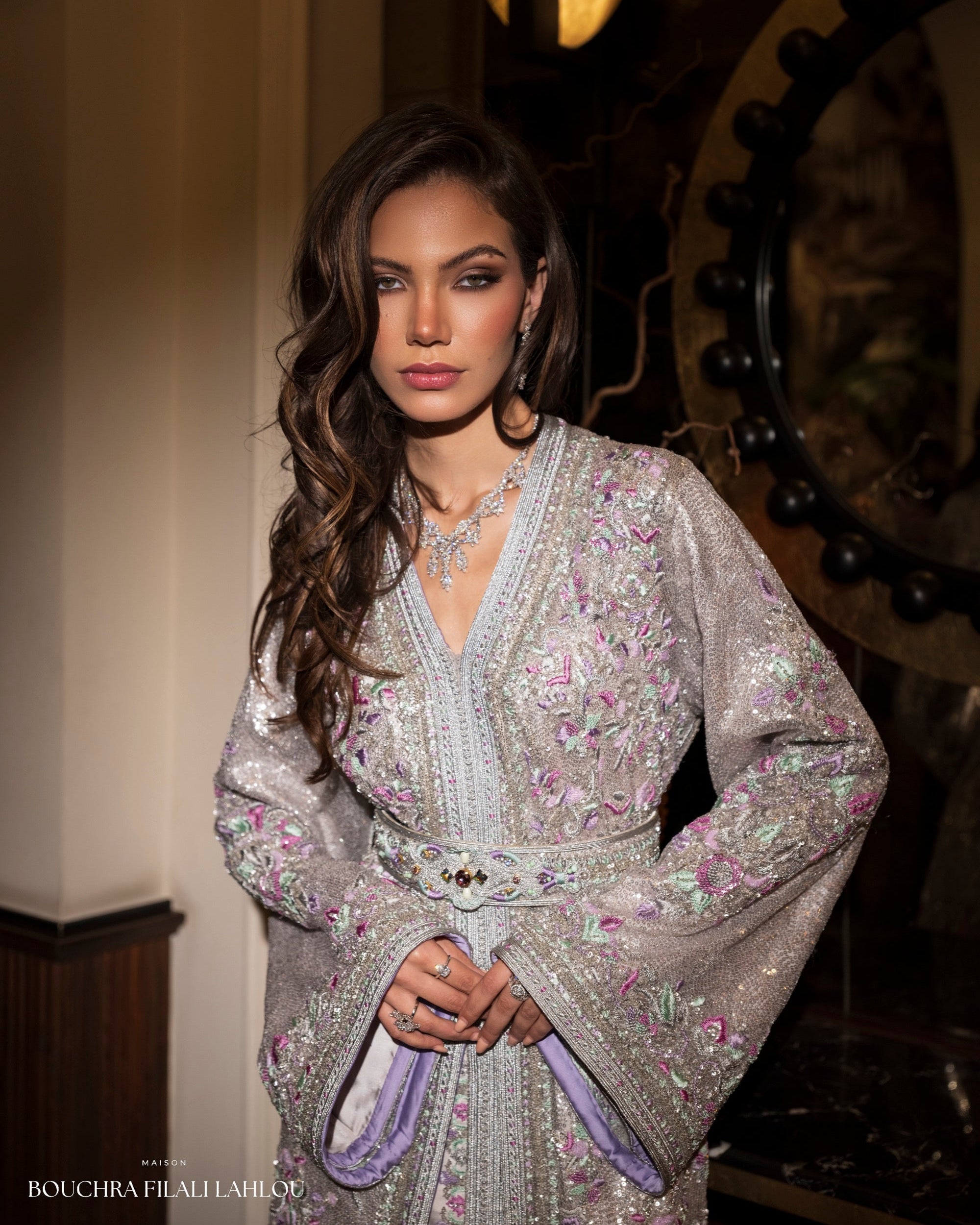 Silver Moroccan caftan detail with lilac mint embroidery and lavender sleeve lining